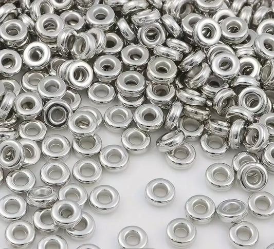 Perles intercalaires plates rondes lisses – 6 mm